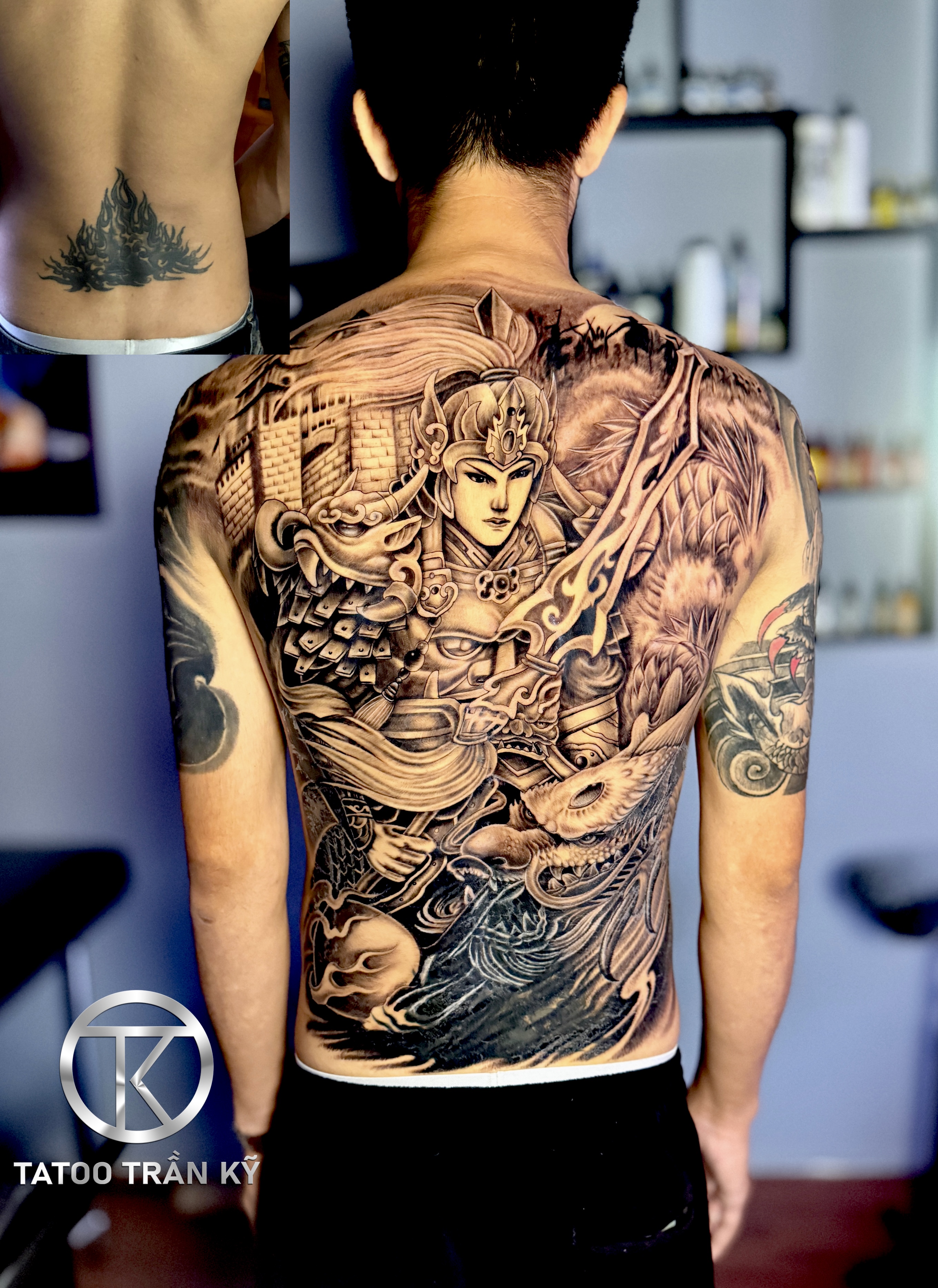 Full back tattoo of Trieu Tu Long over damaged tattoo